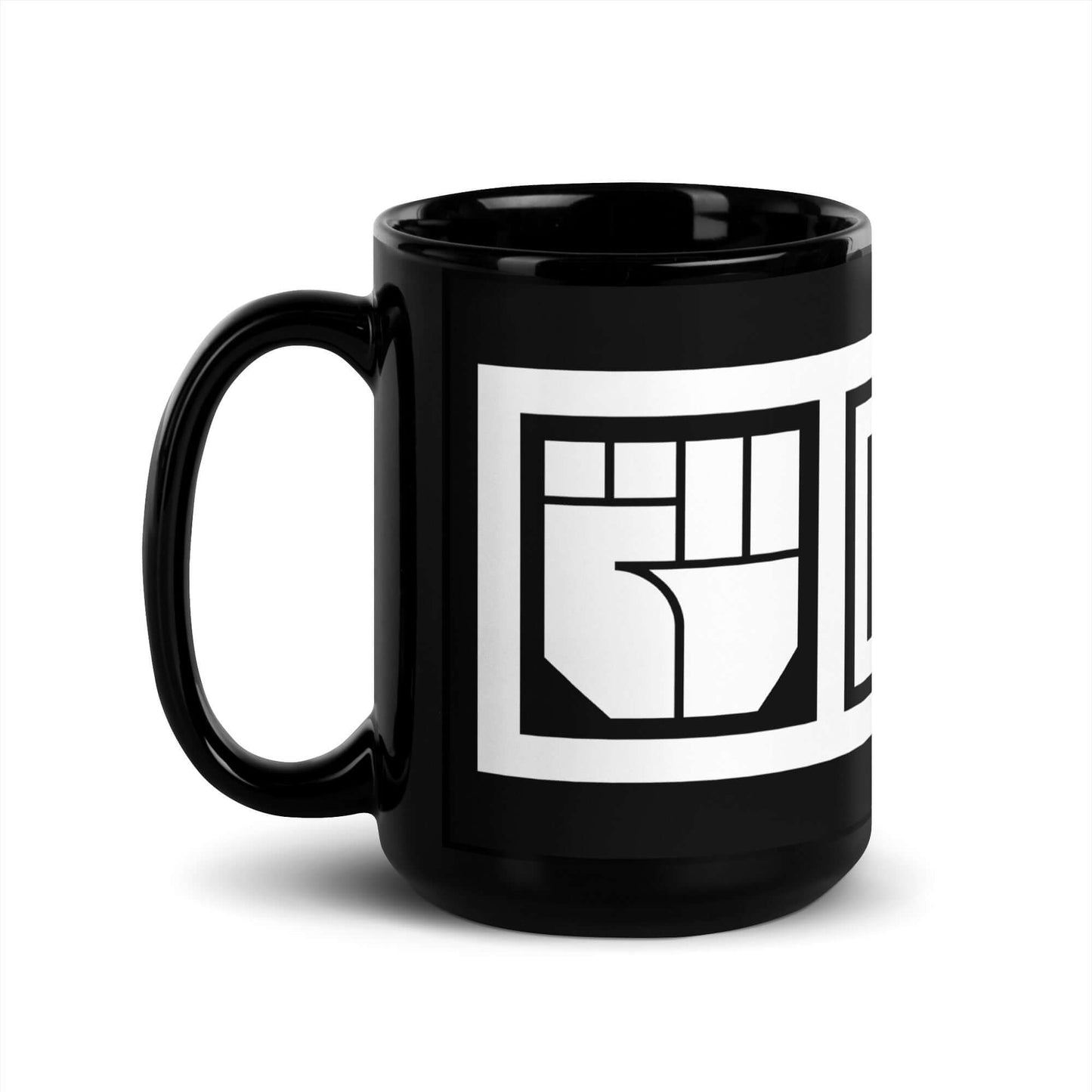 Black mug with a white graphic design on a white background