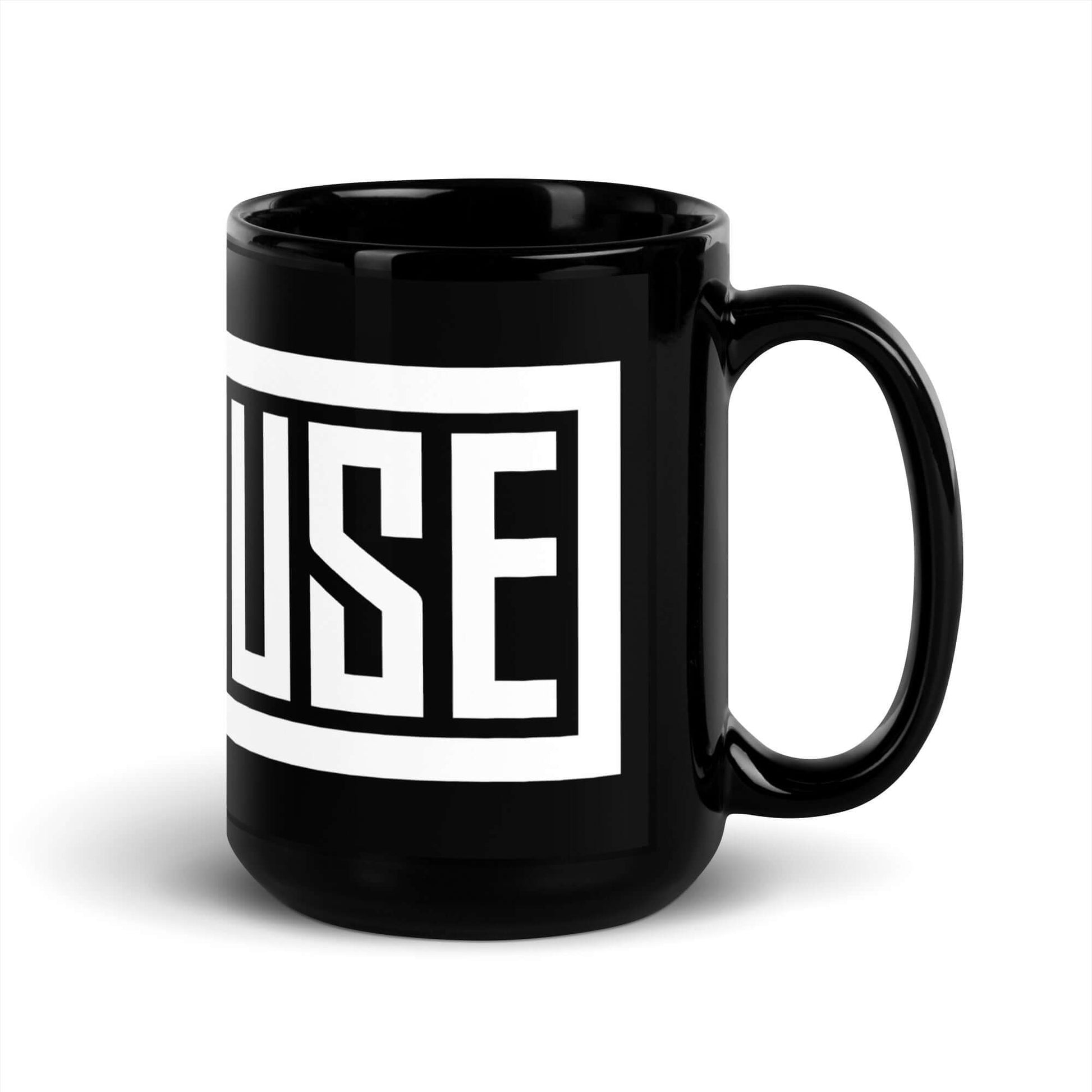 Black mug with a white graphic design on a white background